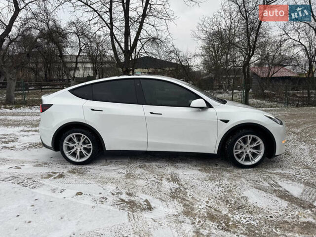 Белый Тесла Model Y, объемом двигателя 0 л и пробегом 60 тыс. км за 29900 $, фото 3 на Automoto.ua