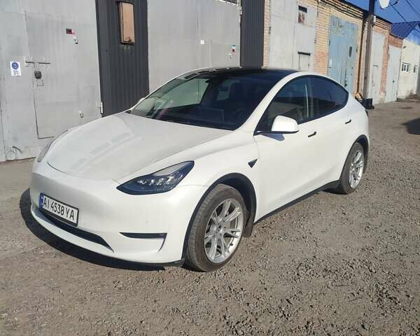 Белый Тесла Model Y, объемом двигателя 0 л и пробегом 76 тыс. км за 23000 $, фото 1 на Automoto.ua