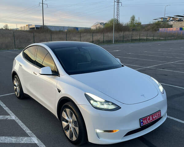 Белый Тесла Model Y, объемом двигателя 0 л и пробегом 76 тыс. км за 23400 $, фото 1 на Automoto.ua