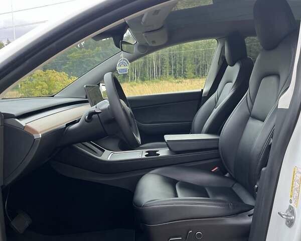 Белый Тесла Model Y, объемом двигателя 0 л и пробегом 87 тыс. км за 25100 $, фото 14 на Automoto.ua