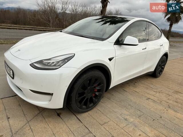 Белый Тесла Model Y, объемом двигателя 0 л и пробегом 58 тыс. км за 23000 $, фото 2 на Automoto.ua