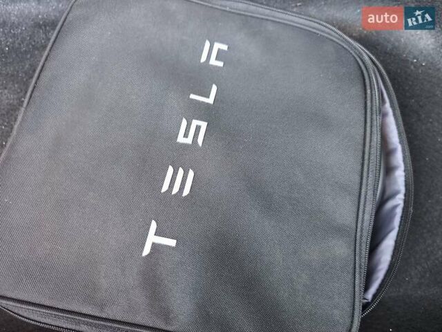 Білий Тесла Model Y, об'ємом двигуна 0 л та пробігом 86 тис. км за 25300 $, фото 20 на Automoto.ua