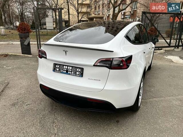 Білий Тесла Model Y, об'ємом двигуна 0 л та пробігом 47 тис. км за 23499 $, фото 56 на Automoto.ua
