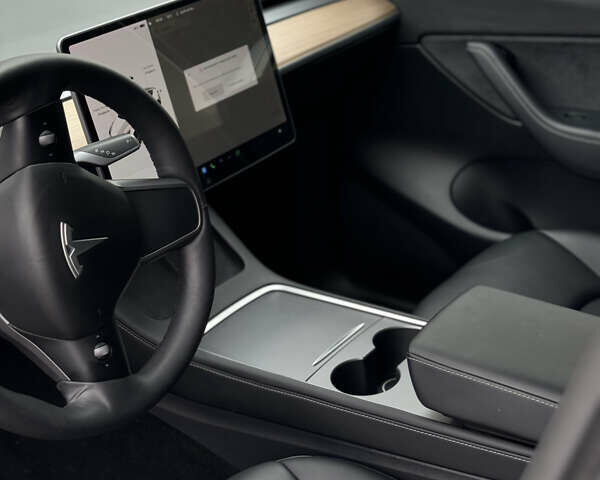 Белый Тесла Model Y, объемом двигателя 0 л и пробегом 51 тыс. км за 29780 $, фото 12 на Automoto.ua