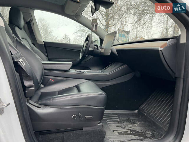 Білий Тесла Model Y, об'ємом двигуна 0 л та пробігом 88 тис. км за 24900 $, фото 30 на Automoto.ua
