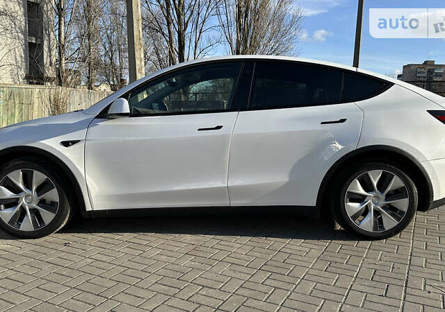 Білий Тесла Model Y, об'ємом двигуна 0 л та пробігом 61 тис. км за 33500 $, фото 22 на Automoto.ua