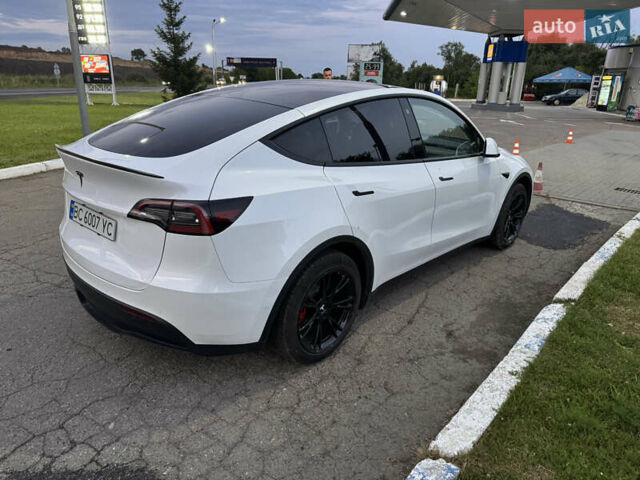 Белый Тесла Model Y, объемом двигателя 0 л и пробегом 79 тыс. км за 27899 $, фото 3 на Automoto.ua
