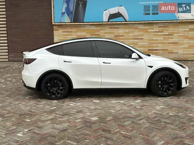 Белый Тесла Model Y, объемом двигателя 0 л и пробегом 86 тыс. км за 26700 $, фото 6 на Automoto.ua