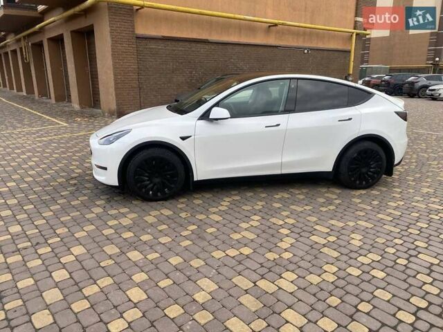 Белый Тесла Model Y, объемом двигателя 0 л и пробегом 74 тыс. км за 23600 $, фото 3 на Automoto.ua
