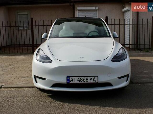 Белый Тесла Model Y, объемом двигателя 0 л и пробегом 67 тыс. км за 27000 $, фото 1 на Automoto.ua