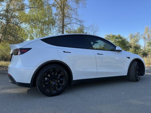 Білий Тесла Model Y, об'ємом двигуна 0 л та пробігом 73 тис. км за 29400 $, фото 2 на Automoto.ua