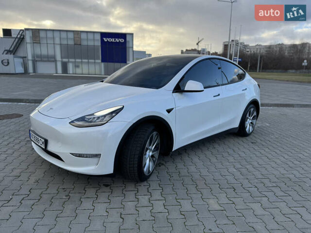 Білий Тесла Model Y, об'ємом двигуна 0 л та пробігом 83 тис. км за 24500 $, фото 4 на Automoto.ua