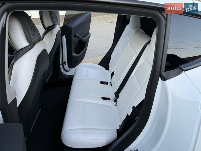 Білий Тесла Model Y, об'ємом двигуна 0 л та пробігом 78 тис. км за 26800 $, фото 24 на Automoto.ua