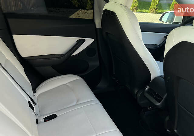 Белый Тесла Model Y, объемом двигателя 0 л и пробегом 88 тыс. км за 25700 $, фото 26 на Automoto.ua