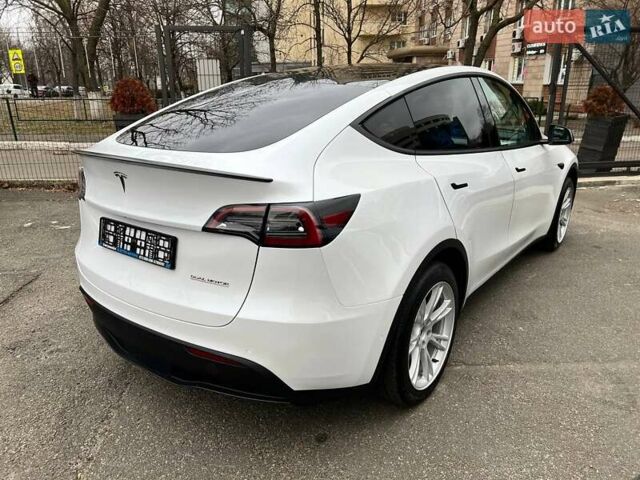 Білий Тесла Model Y, об'ємом двигуна 0 л та пробігом 47 тис. км за 23499 $, фото 53 на Automoto.ua