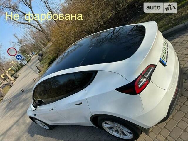 Белый Тесла Model Y, объемом двигателя 0 л и пробегом 56 тыс. км за 40500 $, фото 2 на Automoto.ua