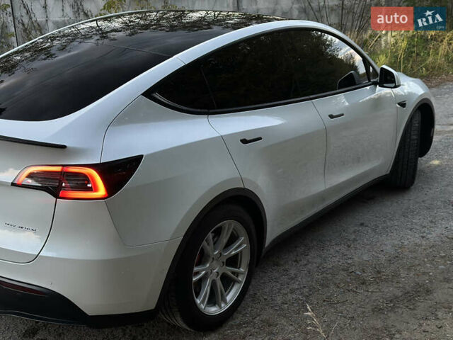 Белый Тесла Model Y, объемом двигателя 0 л и пробегом 57 тыс. км за 30000 $, фото 11 на Automoto.ua