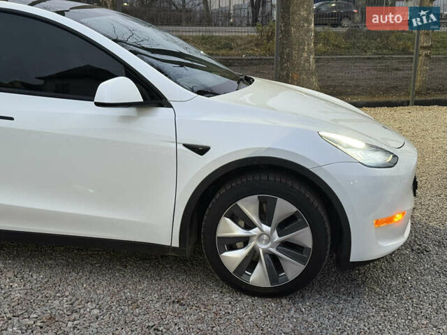Белый Тесла Model Y, объемом двигателя 0 л и пробегом 128 тыс. км за 22600 $, фото 25 на Automoto.ua