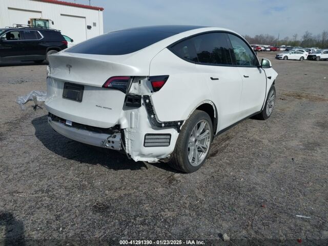 Белый Тесла Model Y, объемом двигателя 0 л и пробегом 102 тыс. км за 15700 $, фото 5 на Automoto.ua