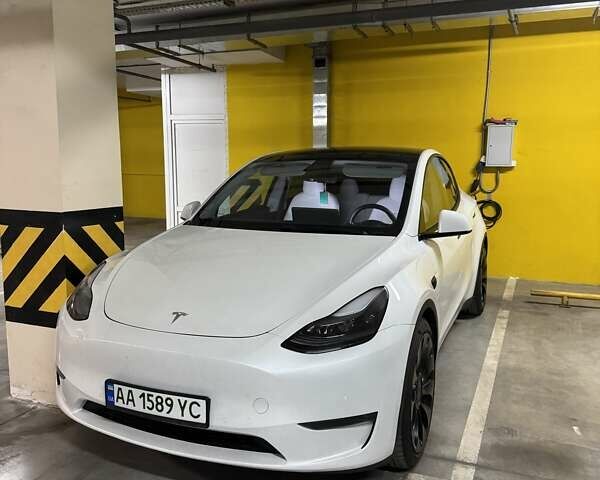 Белый Тесла Model Y, объемом двигателя 0 л и пробегом 47 тыс. км за 26000 $, фото 1 на Automoto.ua