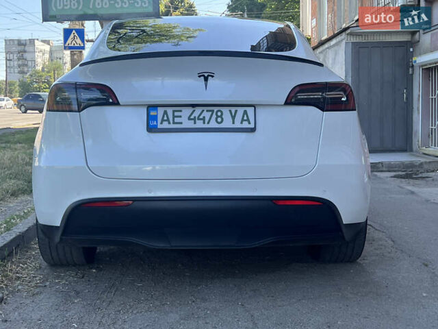 Белый Тесла Model Y, объемом двигателя 0 л и пробегом 63 тыс. км за 25500 $, фото 43 на Automoto.ua
