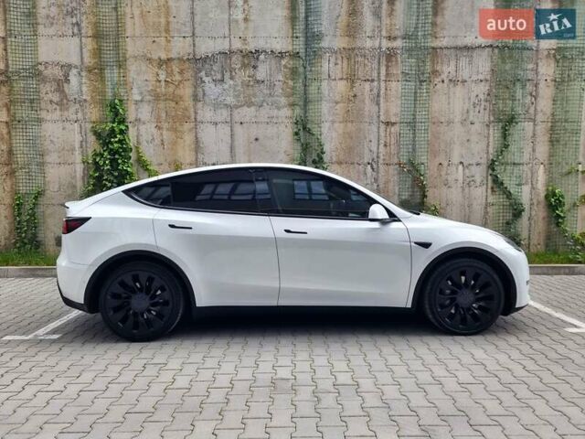 Белый Тесла Model Y, объемом двигателя 0 л и пробегом 98 тыс. км за 26499 $, фото 7 на Automoto.ua