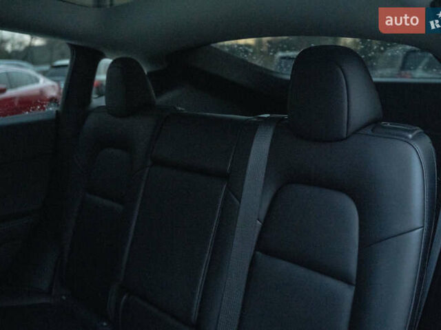 Белый Тесла Model Y, объемом двигателя 0 л и пробегом 69 тыс. км за 27500 $, фото 30 на Automoto.ua