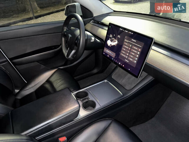 Белый Тесла Model Y, объемом двигателя 0 л и пробегом 128 тыс. км за 22600 $, фото 64 на Automoto.ua