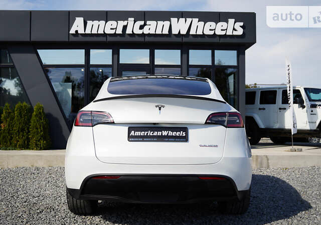 Белый Тесла Model Y, объемом двигателя 0 л и пробегом 30 тыс. км за 26900 $, фото 5 на Automoto.ua