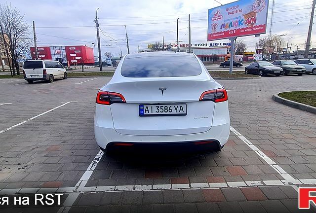 Білий Тесла Model Y, об'ємом двигуна 0 л та пробігом 63 тис. км за 33900 $, фото 7 на Automoto.ua