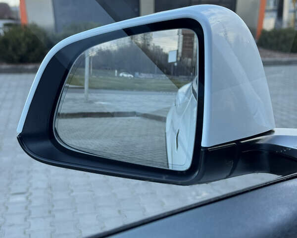 Білий Тесла Model Y, об'ємом двигуна 0 л та пробігом 83 тис. км за 24500 $, фото 23 на Automoto.ua