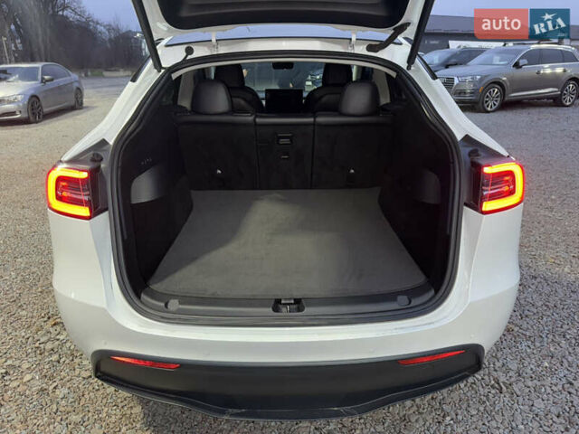 Белый Тесла Model Y, объемом двигателя 0 л и пробегом 128 тыс. км за 22600 $, фото 32 на Automoto.ua