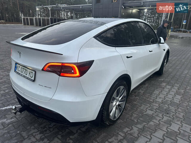 Белый Тесла Model Y, объемом двигателя 0 л и пробегом 55 тыс. км за 25500 $, фото 1 на Automoto.ua