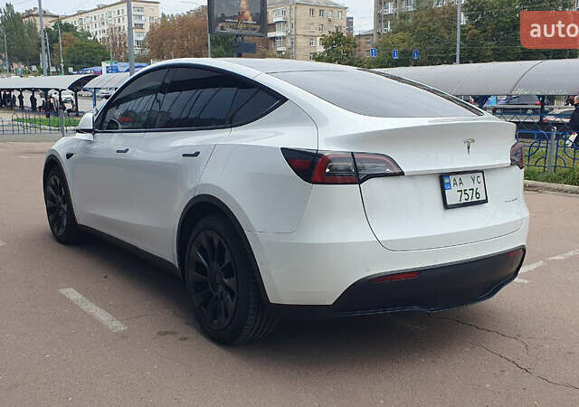 Білий Тесла Model Y, об'ємом двигуна 0 л та пробігом 74 тис. км за 25900 $, фото 4 на Automoto.ua