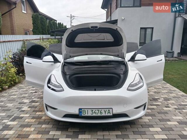 Белый Тесла Model Y, объемом двигателя 0 л и пробегом 195 тыс. км за 26000 $, фото 31 на Automoto.ua