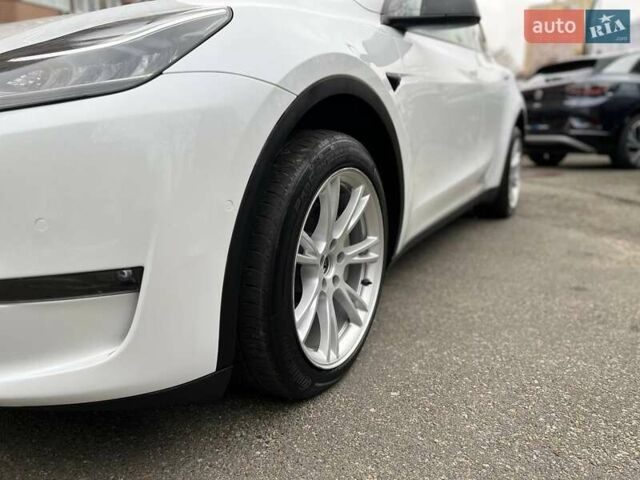 Білий Тесла Model Y, об'ємом двигуна 0 л та пробігом 47 тис. км за 23499 $, фото 22 на Automoto.ua