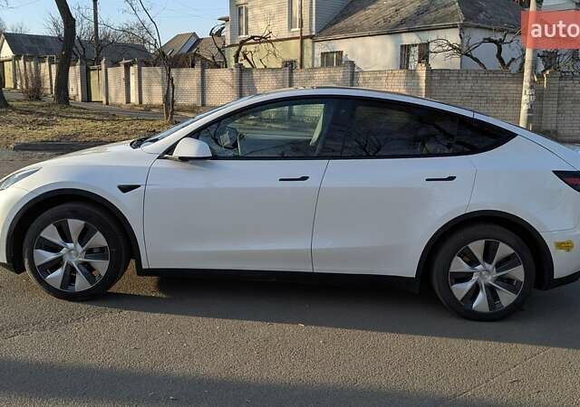 Білий Тесла Model Y, об'ємом двигуна 0 л та пробігом 101 тис. км за 23899 $, фото 8 на Automoto.ua