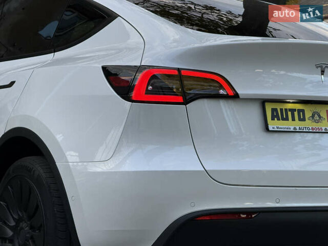Тесла Model Y 2021 в Николаеве на Automoto.ua Белый Тесла Model Y, объемом двигателя 0 л и пробегом 80 тыс. км за 24999 $, фото 16 на Automoto.ua