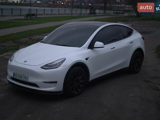Білий Тесла Model Y, об'ємом двигуна 0 л та пробігом 66 тис. км за 23500 $, фото 25 на Automoto.ua