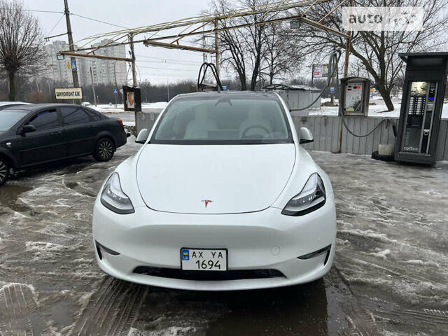 Белый Тесла Model Y, объемом двигателя 0 л и пробегом 57 тыс. км за 36900 $, фото 1 на Automoto.ua