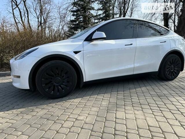 Белый Тесла Model Y, объемом двигателя 0 л и пробегом 56 тыс. км за 40500 $, фото 6 на Automoto.ua