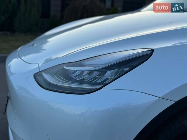 Белый Тесла Model Y, объемом двигателя 0 л и пробегом 38 тыс. км за 24100 $, фото 25 на Automoto.ua