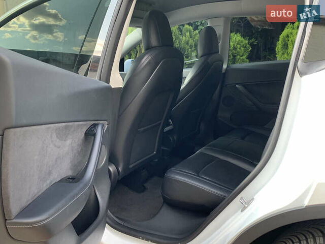 Белый Тесла Model Y, объемом двигателя 0 л и пробегом 52 тыс. км за 21900 $, фото 17 на Automoto.ua