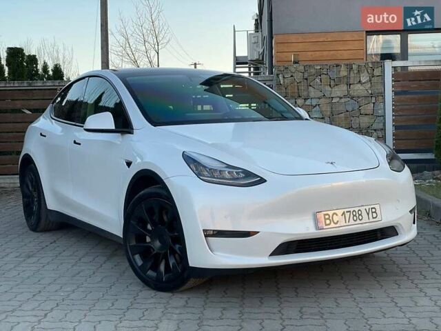 Белый Тесла Model Y, объемом двигателя 0 л и пробегом 56 тыс. км за 24980 $, фото 1 на Automoto.ua