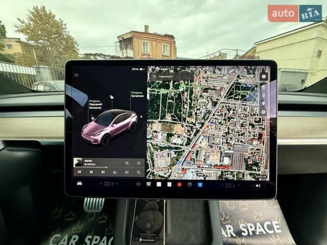 Белый Тесла Model Y, объемом двигателя 0 л и пробегом 88 тыс. км за 26999 $, фото 24 на Automoto.ua