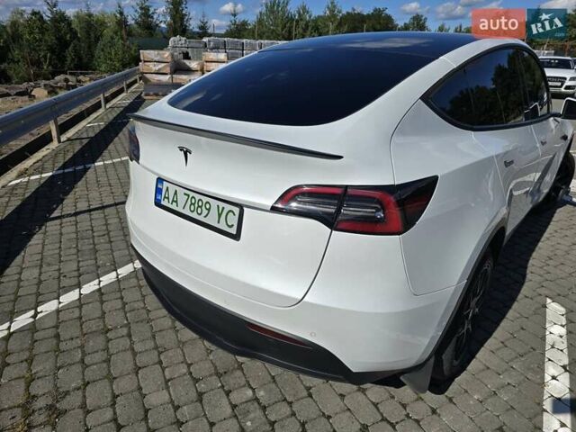Белый Тесла Model Y, объемом двигателя 0 л и пробегом 109 тыс. км за 22000 $, фото 65 на Automoto.ua