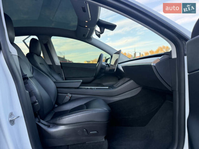 Тесла Model Y 2021 в Хмельницком на Automoto.ua Белый Тесла Model Y, объемом двигателя 0 л и пробегом 83 тыс. км за 25499 $, фото 65 на Automoto.ua