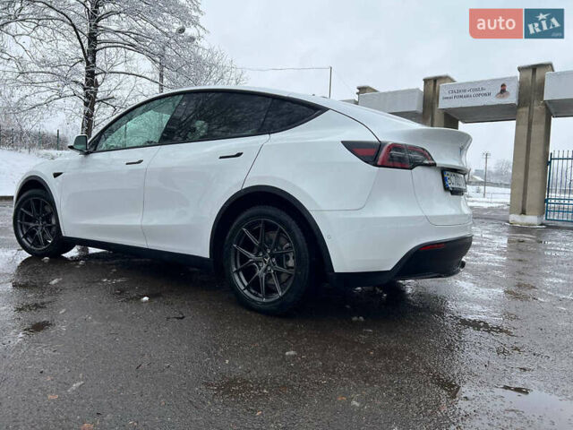 Білий Тесла Model Y, об'ємом двигуна 0 л та пробігом 88 тис. км за 24900 $, фото 7 на Automoto.ua