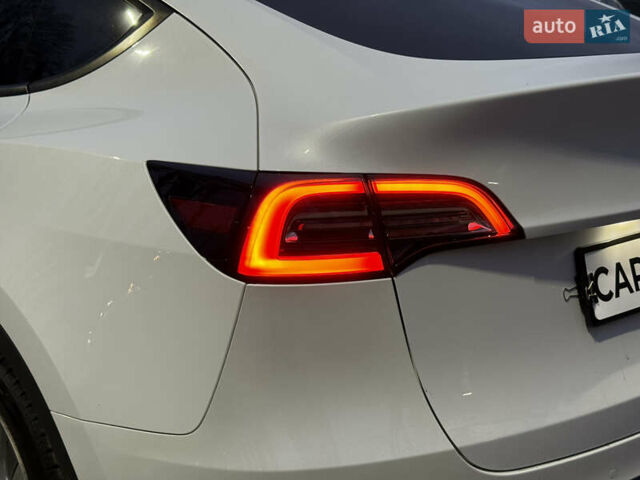 Белый Тесла Model Y, объемом двигателя 0 л и пробегом 128 тыс. км за 22600 $, фото 12 на Automoto.ua