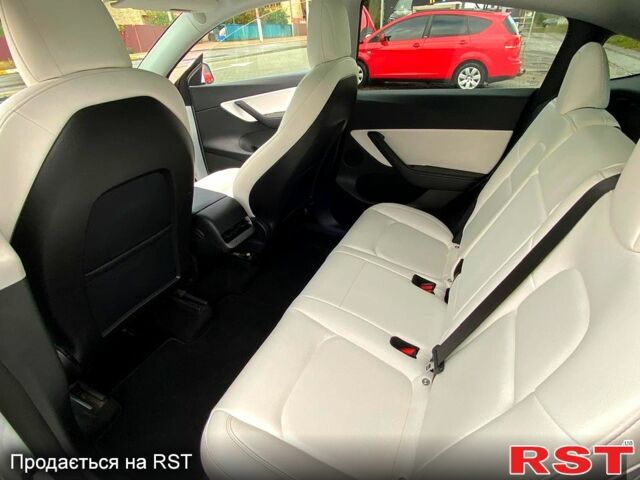 Тесла Model Y 2021 в Ирпене на Automoto.ua Белый Тесла Model Y, объемом двигателя 0 л и пробегом 80 тыс. км за 26700 $, фото 10 на Automoto.ua